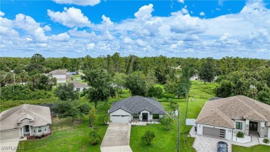 Nestled on an oversized corner lot, and features NEW ROOF 2022 on Bobcat Trail Golf Club in Florida - for sale on GolfHomes.com, golf home, golf lot