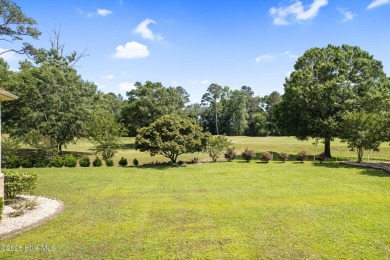 This custom 4-bedroom, 2.5-bath brick home is a true gem on Brunswick Plantation and Golf Resorts in North Carolina - for sale on GolfHomes.com, golf home, golf lot