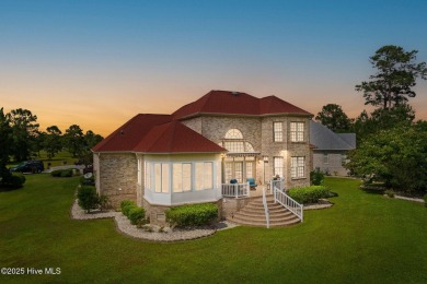 This custom 4-bedroom, 2.5-bath brick home is a true gem on Brunswick Plantation and Golf Resorts in North Carolina - for sale on GolfHomes.com, golf home, golf lot