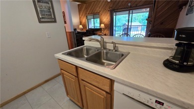Enjoy all the perks of going to the cabin--without any of the on Lakewoods Forest Ridges Golf Club in Wisconsin - for sale on GolfHomes.com, golf home, golf lot