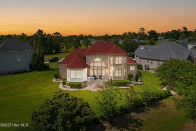 This custom 4-bedroom, 2.5-bath brick home is a true gem on Brunswick Plantation and Golf Resorts in North Carolina - for sale on GolfHomes.com, golf home, golf lot