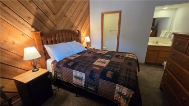 Enjoy all the perks of going to the cabin--without any of the on Lakewoods Forest Ridges Golf Club in Wisconsin - for sale on GolfHomes.com, golf home, golf lot