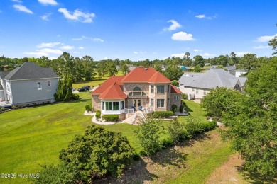 This custom 4-bedroom, 2.5-bath brick home is a true gem on Brunswick Plantation and Golf Resorts in North Carolina - for sale on GolfHomes.com, golf home, golf lot