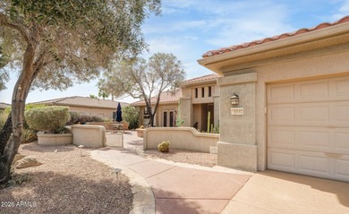 Located in The Point at The Grand in Surprise, this impeccably on Granite Falls Golf Club  in Arizona - for sale on GolfHomes.com, golf home, golf lot