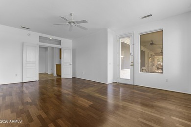 Located in The Point at The Grand in Surprise, this impeccably on Granite Falls Golf Club  in Arizona - for sale on GolfHomes.com, golf home, golf lot