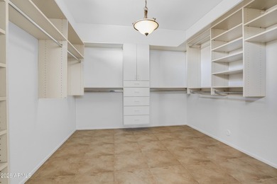 Located in The Point at The Grand in Surprise, this impeccably on Granite Falls Golf Club  in Arizona - for sale on GolfHomes.com, golf home, golf lot