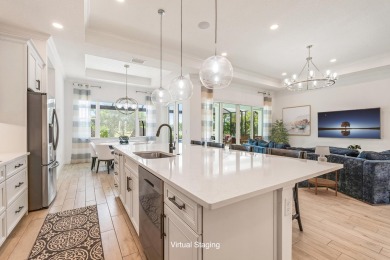 Sleek, smart, and solar-powered--this lavishly upgraded custom on Bent Pine Golf Club in Florida - for sale on GolfHomes.com, golf home, golf lot