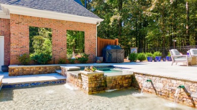 This gorgeous 4BR/3.5BA PLUS Bonus room over garage is perfectly on Reynolds Lake Oconee - The Landing in Georgia - for sale on GolfHomes.com, golf home, golf lot