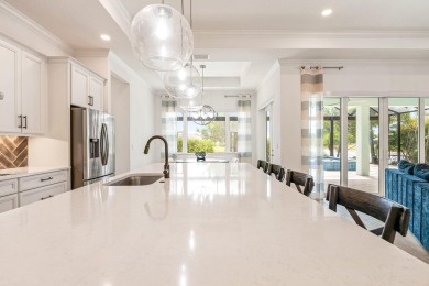Sleek, smart, and solar-powered--this lavishly upgraded custom on Bent Pine Golf Club in Florida - for sale on GolfHomes.com, golf home, golf lot