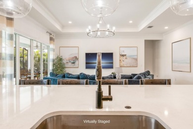 Sleek, smart, and solar-powered--this lavishly upgraded custom on Bent Pine Golf Club in Florida - for sale on GolfHomes.com, golf home, golf lot