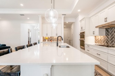 Sleek, smart, and solar-powered--this lavishly upgraded custom on Bent Pine Golf Club in Florida - for sale on GolfHomes.com, golf home, golf lot
