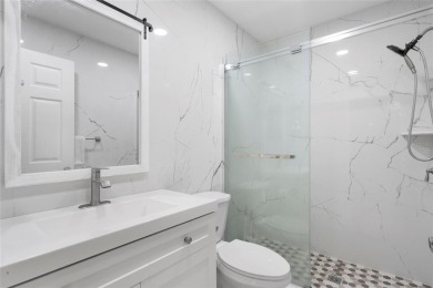 Prime location and move-in ready, this 2-bedroom, 2-bath villa on Seven Springs Golf and Country Club in Florida - for sale on GolfHomes.com, golf home, golf lot