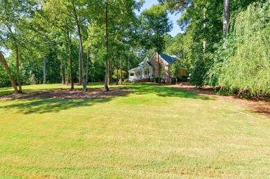This gorgeous 4BR/3.5BA PLUS Bonus room over garage is perfectly on Reynolds Lake Oconee - The Landing in Georgia - for sale on GolfHomes.com, golf home, golf lot