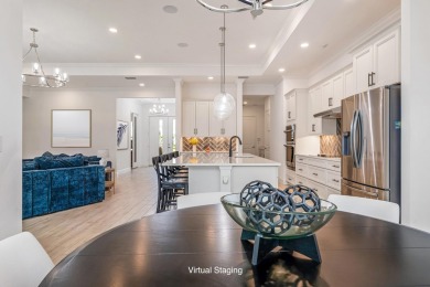 Sleek, smart, and solar-powered--this lavishly upgraded custom on Bent Pine Golf Club in Florida - for sale on GolfHomes.com, golf home, golf lot