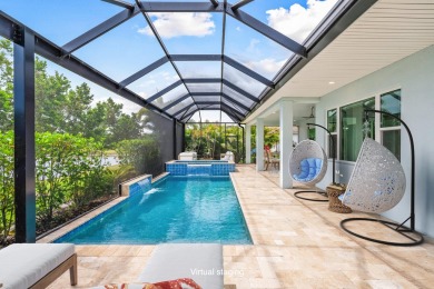 Sleek, smart, and solar-powered--this lavishly upgraded custom on Bent Pine Golf Club in Florida - for sale on GolfHomes.com, golf home, golf lot