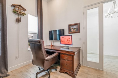 Sleek, smart, and solar-powered--this lavishly upgraded custom on Bent Pine Golf Club in Florida - for sale on GolfHomes.com, golf home, golf lot