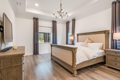 Sleek, smart, and solar-powered--this lavishly upgraded custom on Bent Pine Golf Club in Florida - for sale on GolfHomes.com, golf home, golf lot