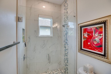 Sleek, smart, and solar-powered--this lavishly upgraded custom on Bent Pine Golf Club in Florida - for sale on GolfHomes.com, golf home, golf lot