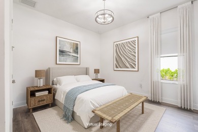Sleek, smart, and solar-powered--this lavishly upgraded custom on Bent Pine Golf Club in Florida - for sale on GolfHomes.com, golf home, golf lot