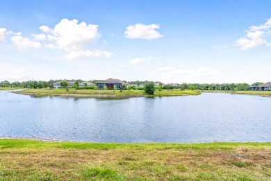 Sleek, smart, and solar-powered--this lavishly upgraded custom on Bent Pine Golf Club in Florida - for sale on GolfHomes.com, golf home, golf lot