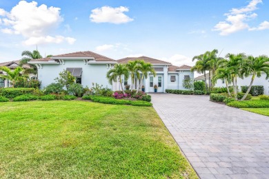Sleek, smart, and solar-powered--this lavishly upgraded custom on Bent Pine Golf Club in Florida - for sale on GolfHomes.com, golf home, golf lot