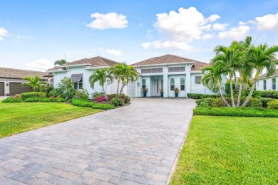 Sleek, smart, and solar-powered--this lavishly upgraded custom on Bent Pine Golf Club in Florida - for sale on GolfHomes.com, golf home, golf lot