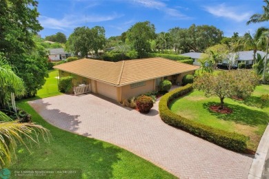 Live in a beautiful golf community without the membership fees! on Country Club of Coral Springs in Florida - for sale on GolfHomes.com, golf home, golf lot