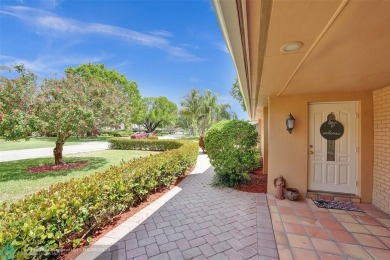 Live in a beautiful golf community without the membership fees! on Country Club of Coral Springs in Florida - for sale on GolfHomes.com, golf home, golf lot