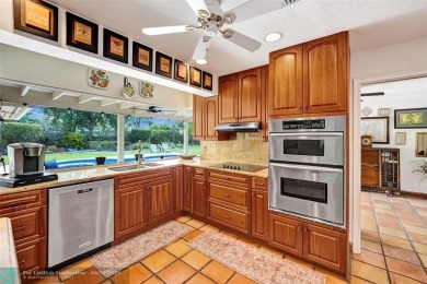 Live in a beautiful golf community without the membership fees! on Country Club of Coral Springs in Florida - for sale on GolfHomes.com, golf home, golf lot