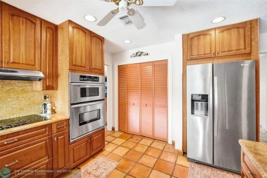 Live in a beautiful golf community without the membership fees! on Country Club of Coral Springs in Florida - for sale on GolfHomes.com, golf home, golf lot