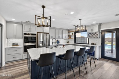 Over $250,000 in this designer remodel and a backyard built like on The Duke At Rancho El Dorado Golf Course in Arizona - for sale on GolfHomes.com, golf home, golf lot