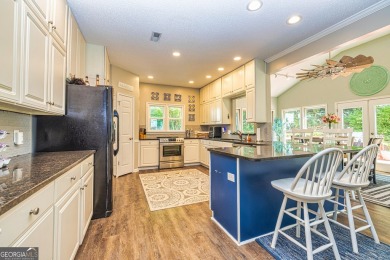 This Beautiful 5 bedroom 3.5 bath home in desirable Windalier on Canongate At Flat Creek Club in Georgia - for sale on GolfHomes.com, golf home, golf lot
