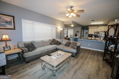 Welcome home to 116 Eastlake Landing, nestled in the highly on Summergrove Golf Club in Georgia - for sale on GolfHomes.com, golf home, golf lot