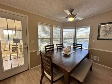 Discover this charming 1996 Homes of Merit "TURNKEY" on Four Lakes Golf Club in Florida - for sale on GolfHomes.com, golf home, golf lot