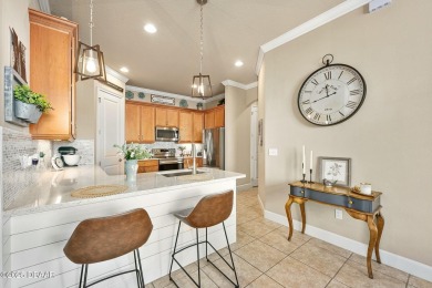 Maintenance-Free Living in Plantation Bay! This beautifully on Plantation Bay Golf and Country Club in Florida - for sale on GolfHomes.com, golf home, golf lot