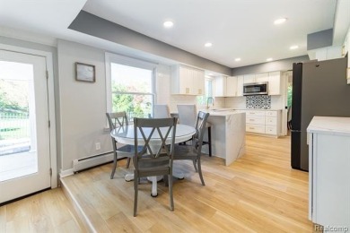 Welcome to this stunning, elegantly updated colonial nestled in on Hilltop Golf Course in Michigan - for sale on GolfHomes.com, golf home, golf lot