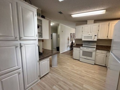 Discover this charming 1996 Homes of Merit "TURNKEY" on Four Lakes Golf Club in Florida - for sale on GolfHomes.com, golf home, golf lot