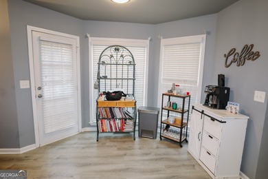 Welcome home to 116 Eastlake Landing, nestled in the highly on Summergrove Golf Club in Georgia - for sale on GolfHomes.com, golf home, golf lot