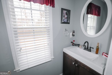 Welcome home to 116 Eastlake Landing, nestled in the highly on Summergrove Golf Club in Georgia - for sale on GolfHomes.com, golf home, golf lot