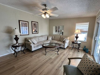 Discover this charming 1996 Homes of Merit "TURNKEY" on Four Lakes Golf Club in Florida - for sale on GolfHomes.com, golf home, golf lot