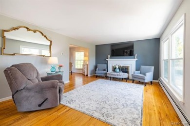 Welcome to this stunning, elegantly updated colonial nestled in on Hilltop Golf Course in Michigan - for sale on GolfHomes.com, golf home, golf lot