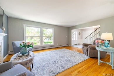 Welcome to this stunning, elegantly updated colonial nestled in on Hilltop Golf Course in Michigan - for sale on GolfHomes.com, golf home, golf lot