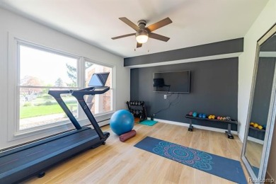 Welcome to this stunning, elegantly updated colonial nestled in on Hilltop Golf Course in Michigan - for sale on GolfHomes.com, golf home, golf lot