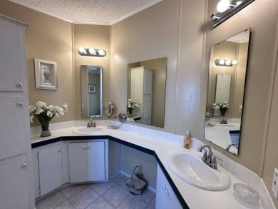 Discover this charming 1996 Homes of Merit "TURNKEY" on Four Lakes Golf Club in Florida - for sale on GolfHomes.com, golf home, golf lot