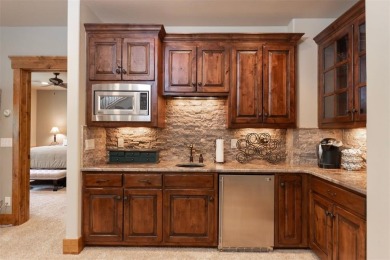 Designed for easy single-level living, this immaculate on Raven Golf Club At Three Peaks in Colorado - for sale on GolfHomes.com, golf home, golf lot
