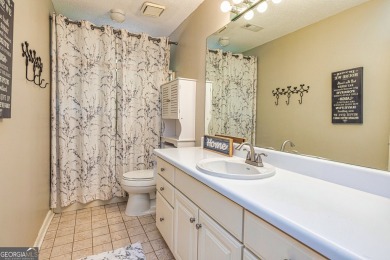 This Beautiful 5 bedroom 3.5 bath home in desirable Windalier on Canongate At Flat Creek Club in Georgia - for sale on GolfHomes.com, golf home, golf lot