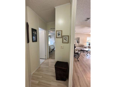 Discover this charming 1996 Homes of Merit "TURNKEY" on Four Lakes Golf Club in Florida - for sale on GolfHomes.com, golf home, golf lot