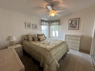 Discover this charming 1996 Homes of Merit "TURNKEY" on Four Lakes Golf Club in Florida - for sale on GolfHomes.com, golf home, golf lot