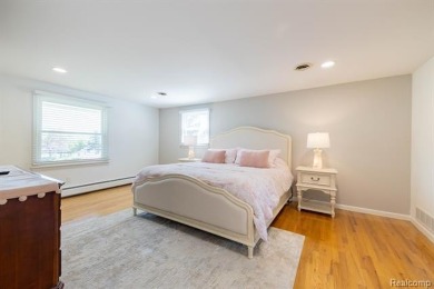 Welcome to this stunning, elegantly updated colonial nestled in on Hilltop Golf Course in Michigan - for sale on GolfHomes.com, golf home, golf lot