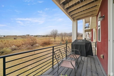 This stunning townhome, nestled against the picturesque Talons on Talons Cove Golf Club in Utah - for sale on GolfHomes.com, golf home, golf lot